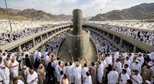 Muslim pilgrims pelting the Jamarat pillars during the 11th Day of Dhul-Hijja in Mina
