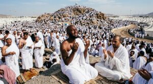 Muslim pilgrims making supplications and reading authentic duas on the Day of Arafah during Hajj