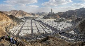 Aerial view of the massive tent city covering the Plain of Mina, Saudi Arabia, during the 8th Day of Dhul-Hijja (Tarwiyah Day)